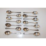 Fourteen silver teaspoons with engraving relating