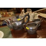 A silver plated three piece tea service