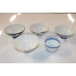 Four rice bowls; and a tea bowl with two character