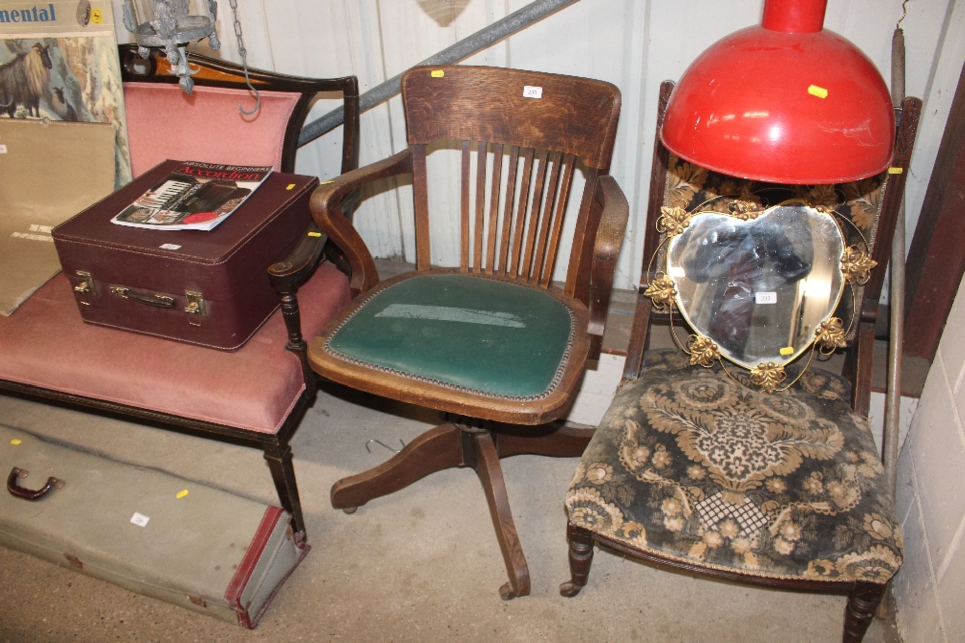 A 1920's oak swivel office chair