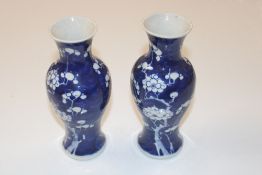 A pair of Oriental decorated blue and white balust