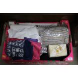 A box containing various fabrics; and a jewellery