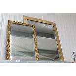 Two gilt framed bevelled edge wall mirrors