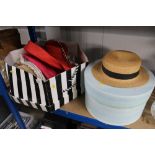 A quantity of various hats and two hat boxes