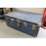 A blue travelling trunk
