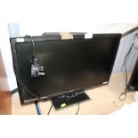 A Technika flat screen television and remote control