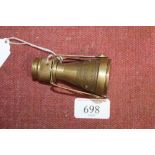 A reproduction brass telescope