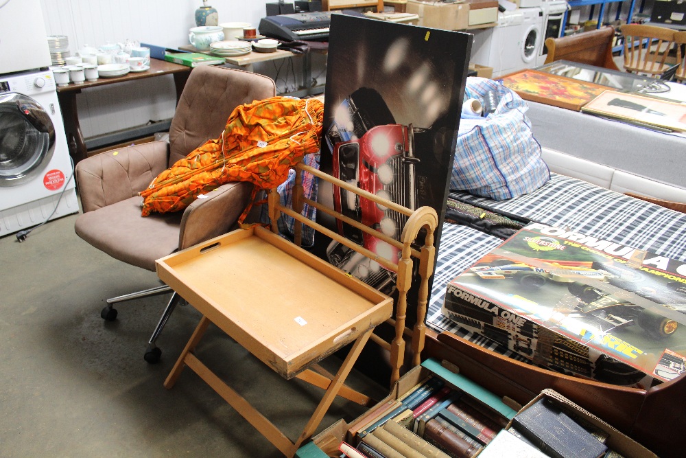 A pine towel rail, a bed tray and a canvas depicti