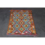 An approx. 3'8" x 2'5" Chobi Kelim rug