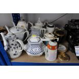 A collection of various teapots to include Adams B