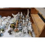 A quantity of various ornaments to include cherubs