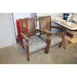 A pair of oak and wicker backed floral upholstered