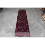 An approx. 7'8" x 1'9" Meswani runner