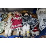 A quantity of porcelain dolls