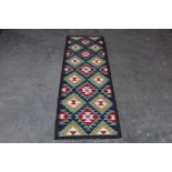 An approx. 6'5" x 2' Maimana Kelim runner