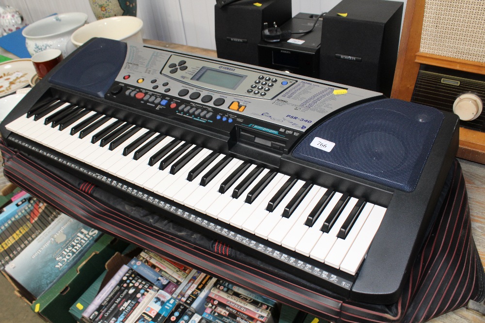 A Yamaha PSR-340 electric keyboard