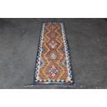 An approx. 6'5" x 2' Chobi Kelim runner