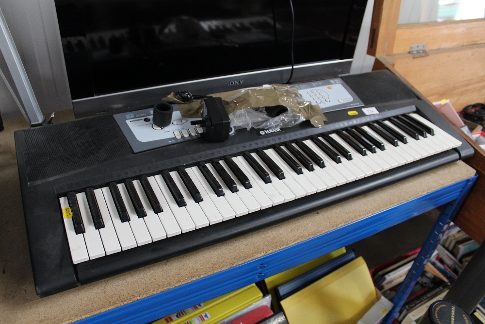 A Yamaha PSR-E213 keyboard