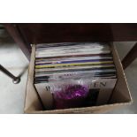 A box containing various records