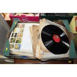 A box containing various records