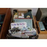 A box containing stamp albums; cigarette cards; Fi