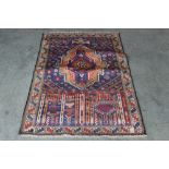 An approx. 4'6" x 2'9" Old Bolochi rug