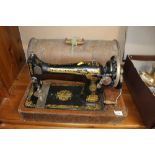 A Singer sewing machine in fitted case
