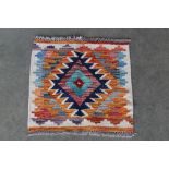 An approx. 1'6" x 1'5" Chobi Kelim rug