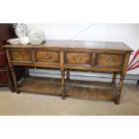 An Ipswich oak hall table fitted with four drawers