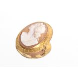 A 9ct gold mounted oval cameo brooch, approx. 6.5gms, measuring approx. 3.5cm x 3cm