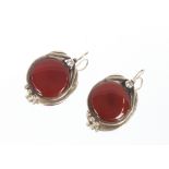 A large pair of silver and cornelian stone ear-rings