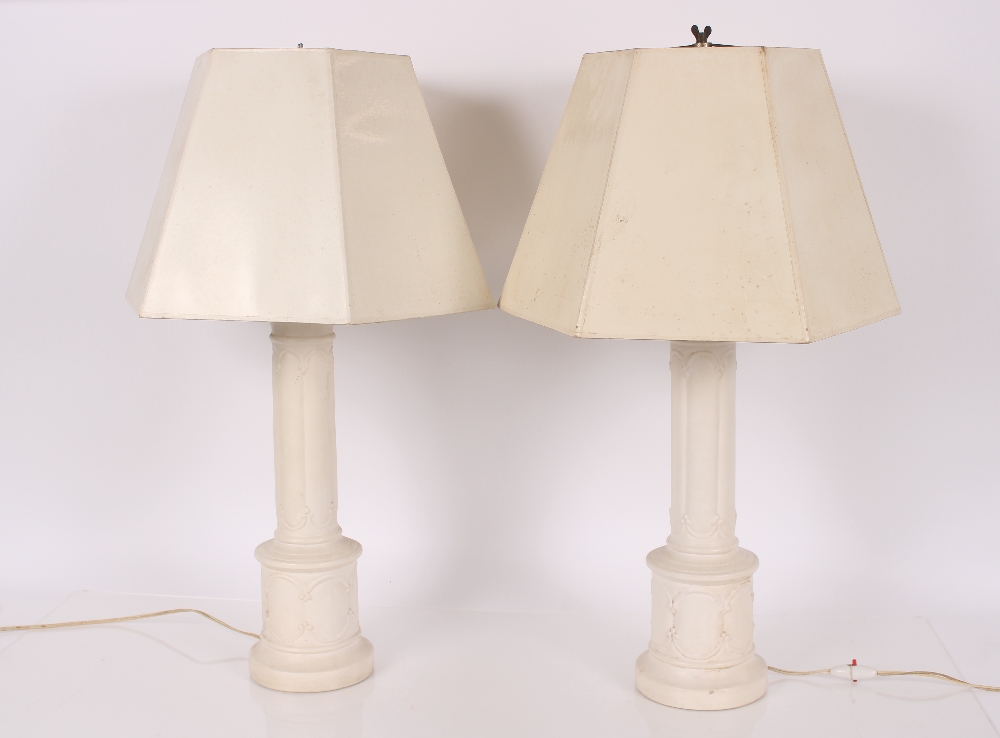 A pair of contemporary Parian type classical column table lamps, complete with shades
