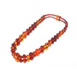 A large amber bead necklace approx. length 50cm