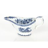 An 18th Century blue and white porcelain bow sauce boat, circa 1760, 684 pattern, 20cm long; and