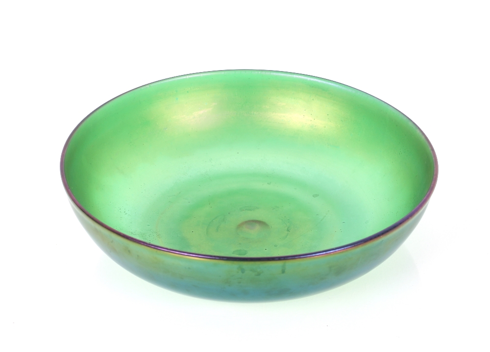 A large green iridescent glass bowl, in the Loetz style, 37cm dia.