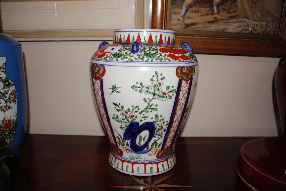 A Chinese baluster jar, having lop handles, brightly coloured enamel decoration, 33cm high - Image 3 of 20