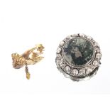 A 9ct gold hand brooch; together with a large green stone and silver mounted brooch (2)