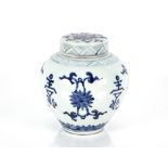 A Chinese blue and white ginger jar and cover, decorated flowers and calligraphy, 21cm high