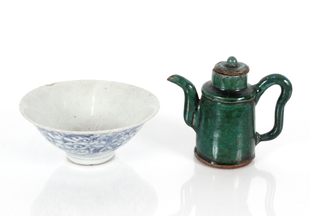 A 17th Century Chinese porcelain pedestal bowl, 16.5cm dia.; and a green glazed Chinese wine pot