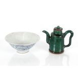 A 17th Century Chinese porcelain pedestal bowl, 16.5cm dia.; and a green glazed Chinese wine pot