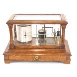 An oak cased barograph by Short & Mason London, complete with chart drawer, 38cm long