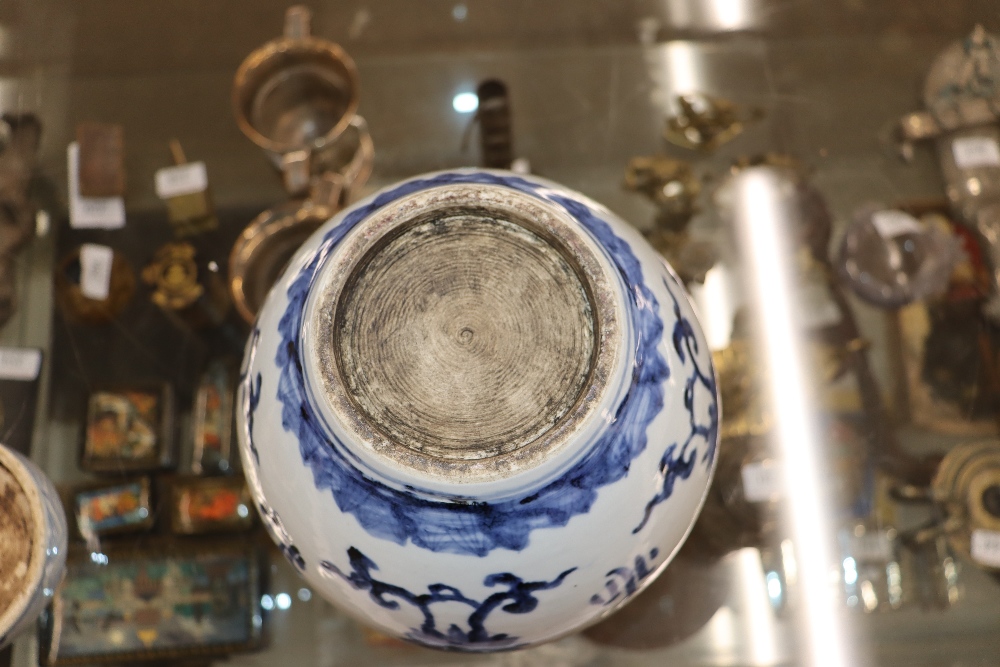 A Chinese blue and white ginger jar and cover, decorated flowers and calligraphy, 21cm high - Image 19 of 24