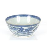 A large Chinese blue and white bowl, decorated river and pagoda scenes, 37cm dia. (star crack to