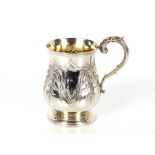 A Victorian silver embossed and engraved bell shaped three quarter pint tankard, London 1857, 13cm