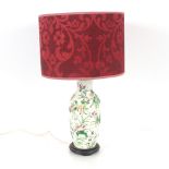 A Canton pattern baluster table lamp, and red shade