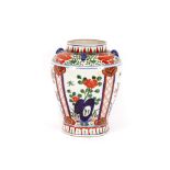 A Chinese baluster jar, having lop handles, brightly coloured enamel decoration, 33cm high