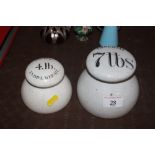 Two pottery cased imperial weights 4lb and 7lb