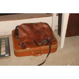 Two leather bags and a suitcase