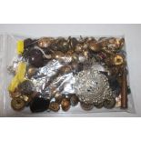 A bag of mixed military badges and buttons etc.