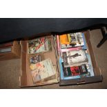 Two boxes of various books, some military related